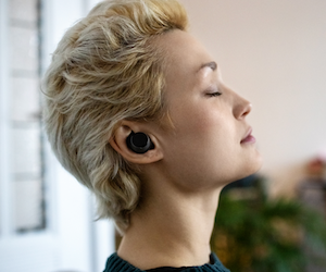 woman wearing earbuds