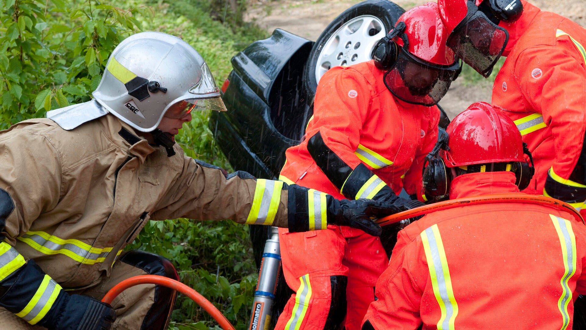 first responders helping on the scene of a car accident