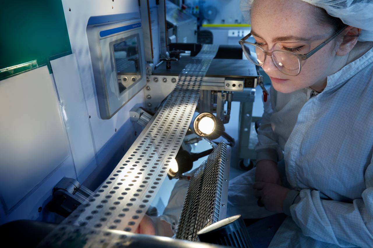 associate inspecting product in a plant