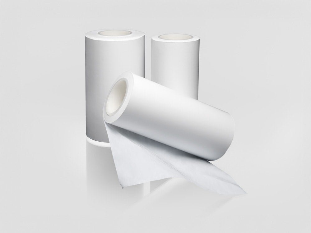 3 rolls of microfiltration media on a gray background