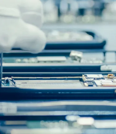 Image of technician working in a smartphone