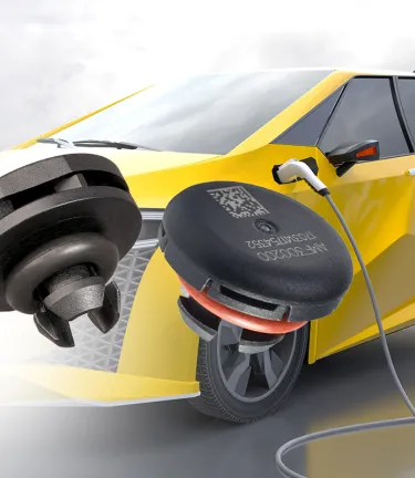 Yellow electric car being charged, contains Gore Automotive Vents