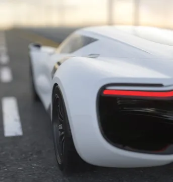 Modern generic electric white sports car at sunrise charging before a race