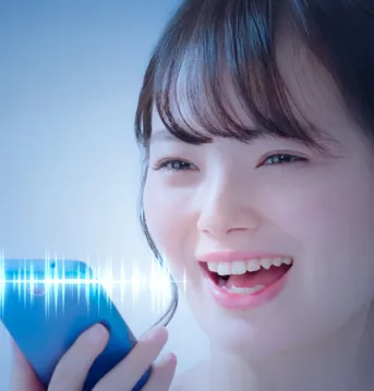 Woman talking on a cellphone with a visual depiction of sound waves